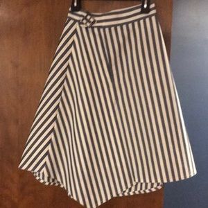 Asymmetrical high wasted jean tea length skirt